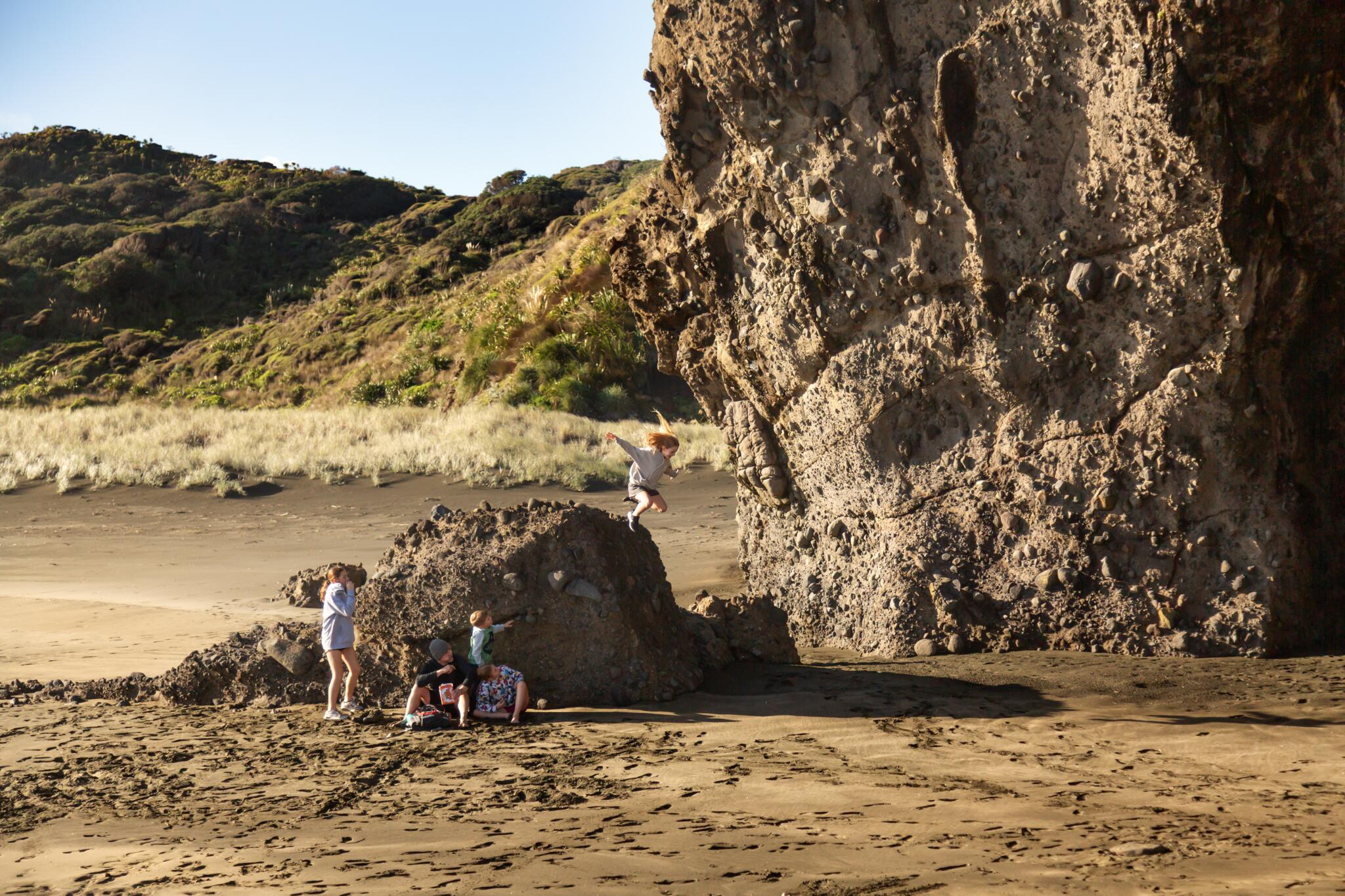 kids jumping off rocks anawhata